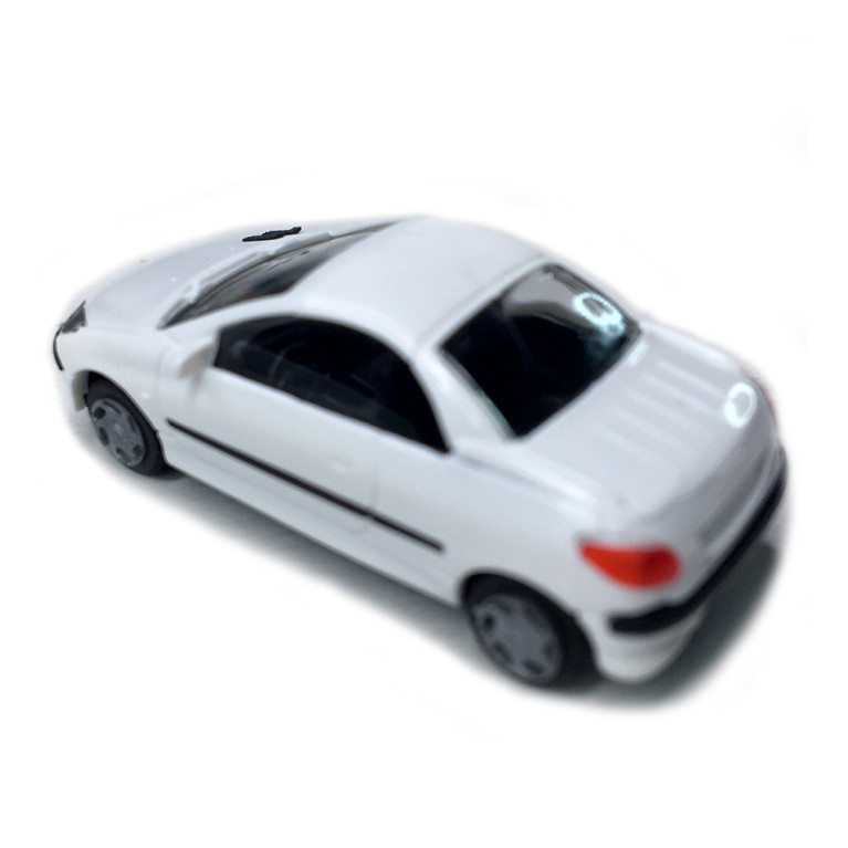Peugeot 206 coupé, blanche - SAI 2189 - HO 1/87