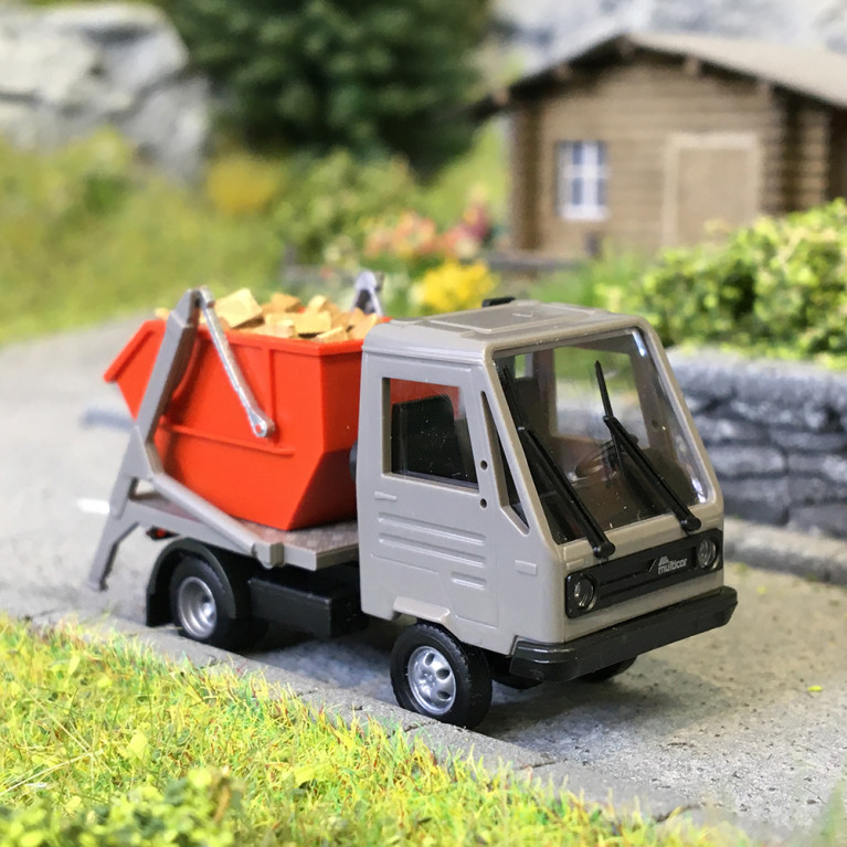 Multicar M26, avec chargeur à benne et grumes - BUSCH 42237- HO 1/87