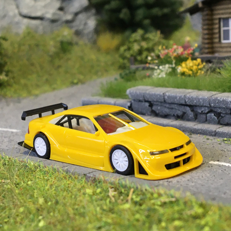 Opel Calibra, Phase IV, jaune, 1993 - HERPA 022101-002 - HO 1/87